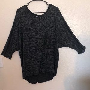 The brand is Olivia Blu. The size is XL. It is a grayish/ blackish color.